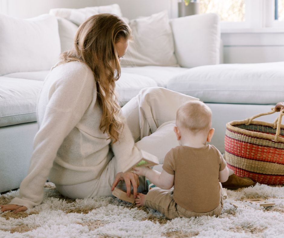 Mother and child in a calming, minimalist living room designed for well-being